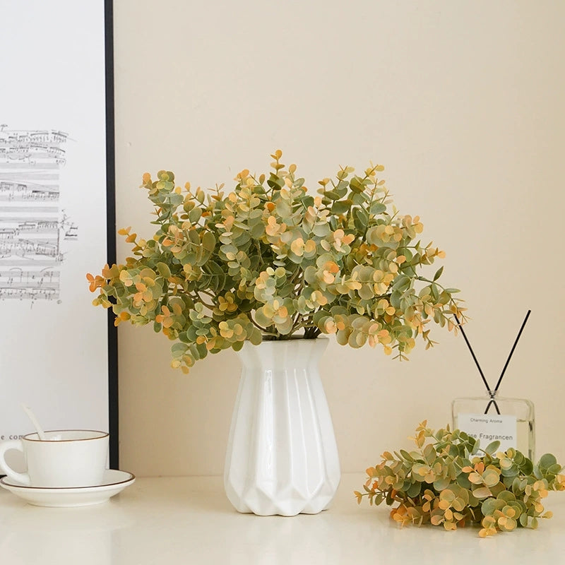 real-touch-faux-eucalyptus-in-white-ceramic-vase
