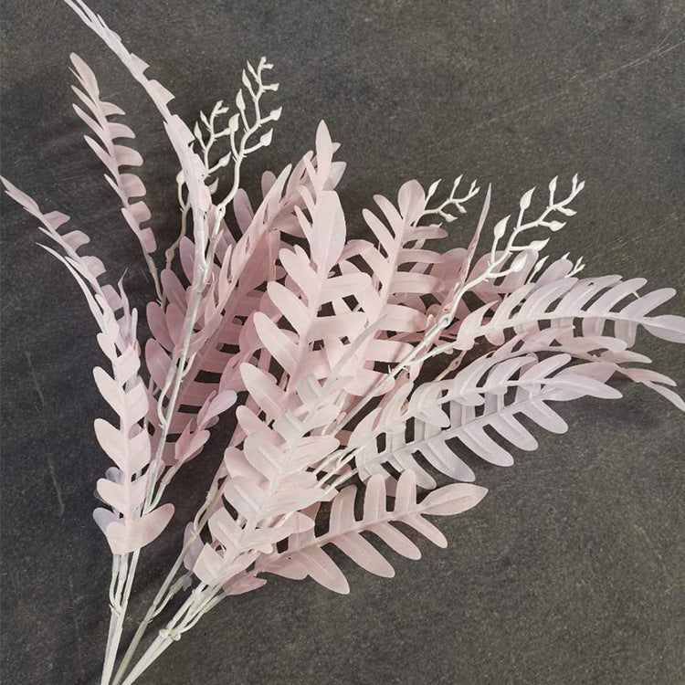 Red artificial locust leaf sprigs for wedding backdrop