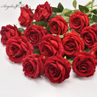 blush_faux_rose_with_green_leaves