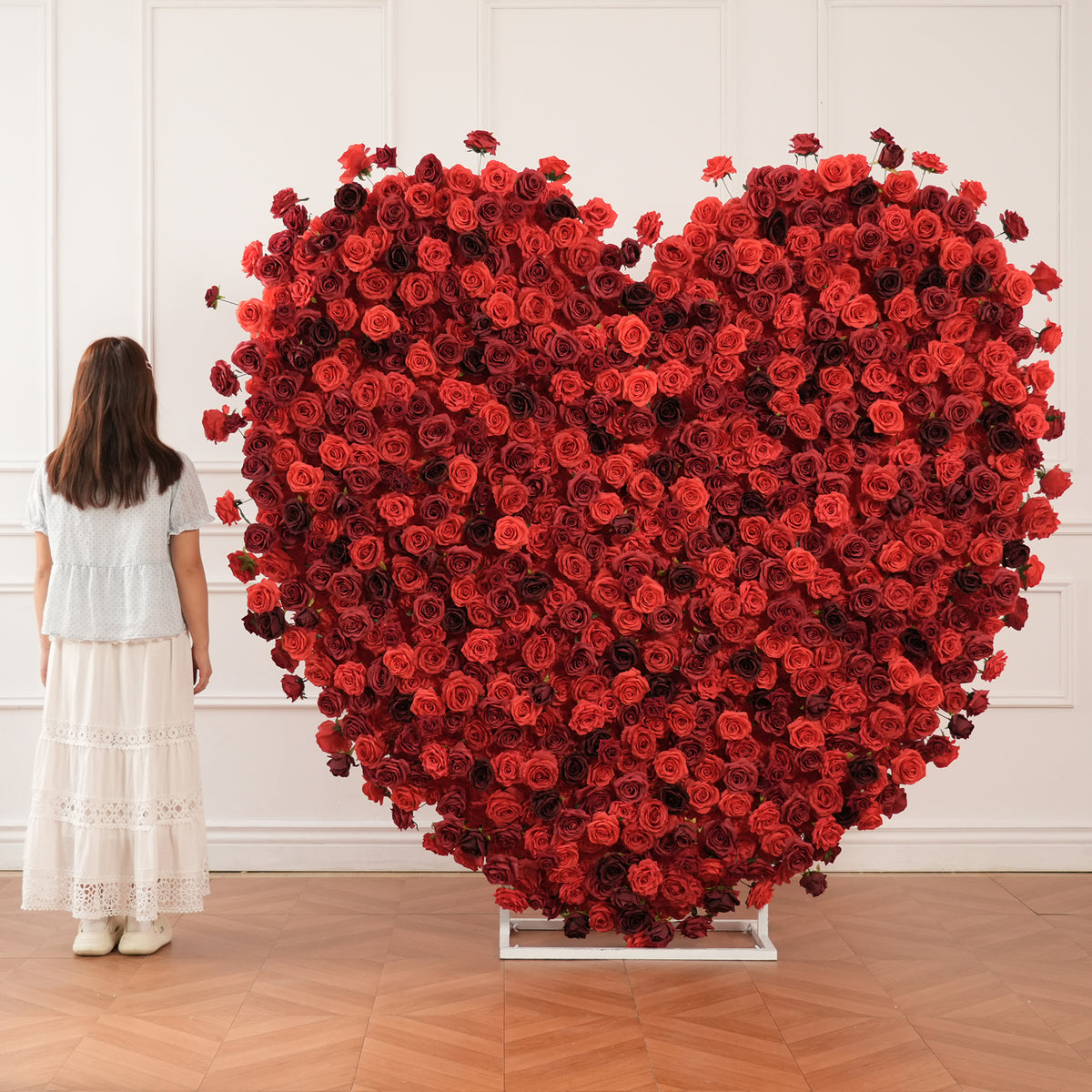 Red heart rose flower wall with neon sign wedding scene