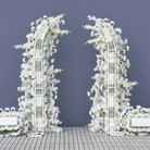 Elegant asymmetrical white flower curved arch for wedding ceremony