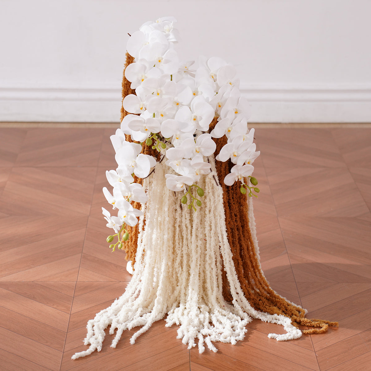 wedding flower display with white orchids and amaranthus