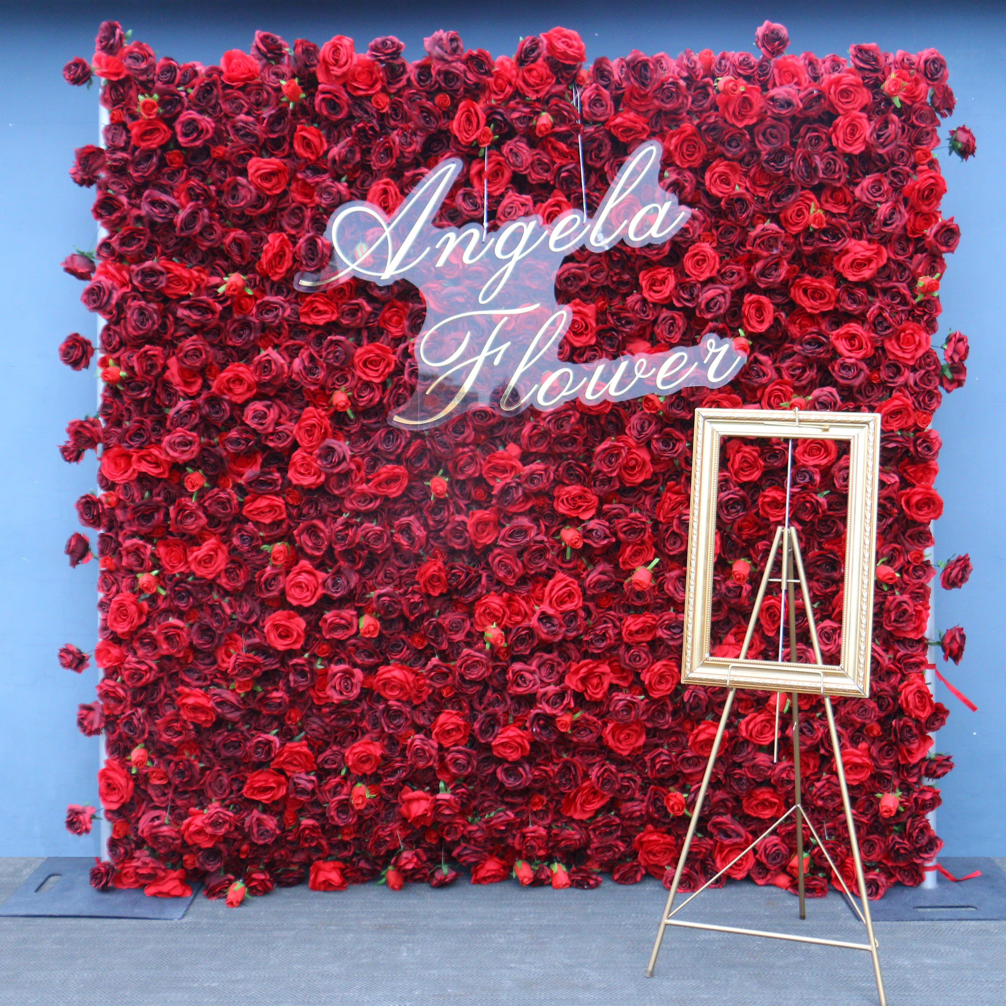 Close‑up texture view of realistic deep red faux rose flower wall panel
