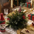 Holiday photo backdrop christmas arch with winter greenery, red magnolia and hanging tassels