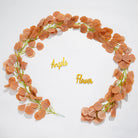 Outdoor wedding faux eucalyptus strand arch greenery decor