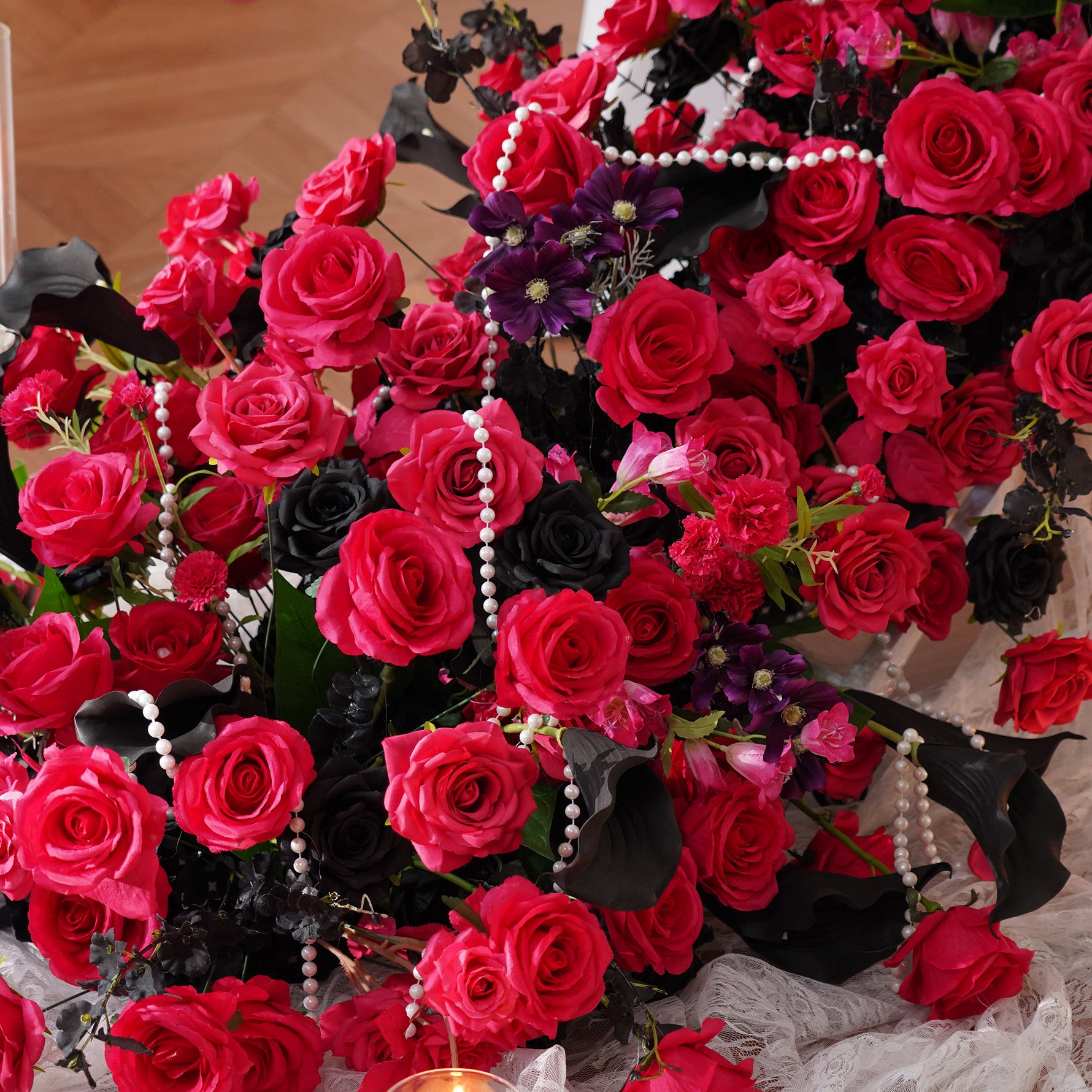 red-silk-rose-black-leaf-wedding-decoration