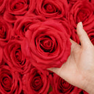 Red silk rose heads for romantic wedding floral arrangements