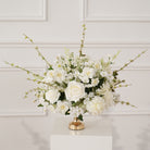 White green floral pack for lakeside outdoor wedding setup