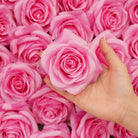 Assorted artificial rose blooms for seasonal floral designs