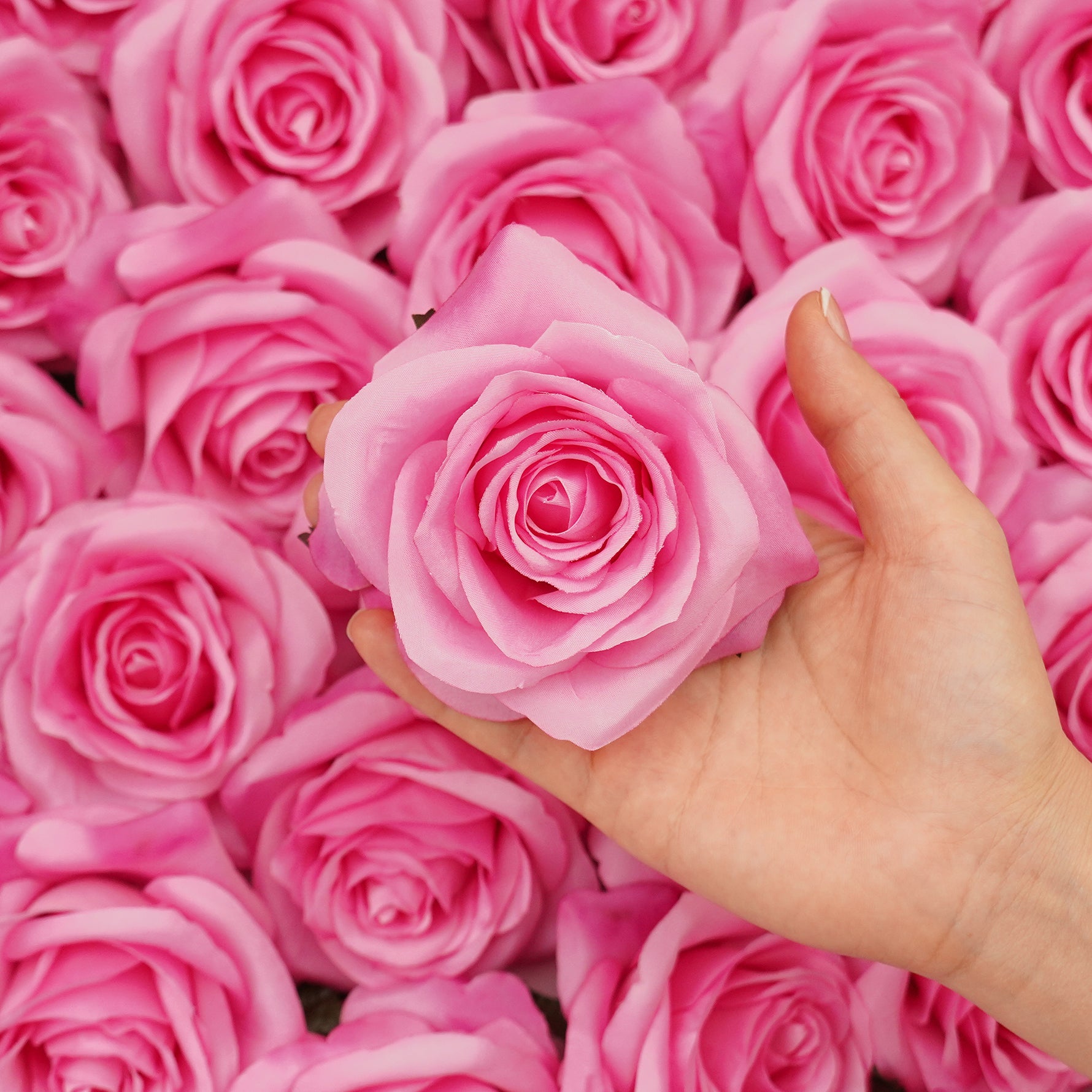 Assorted artificial rose blooms for seasonal floral designs