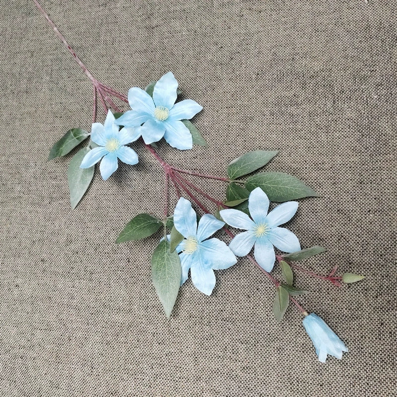 multi‑colored-faux-clematis-bloom-home-styling
