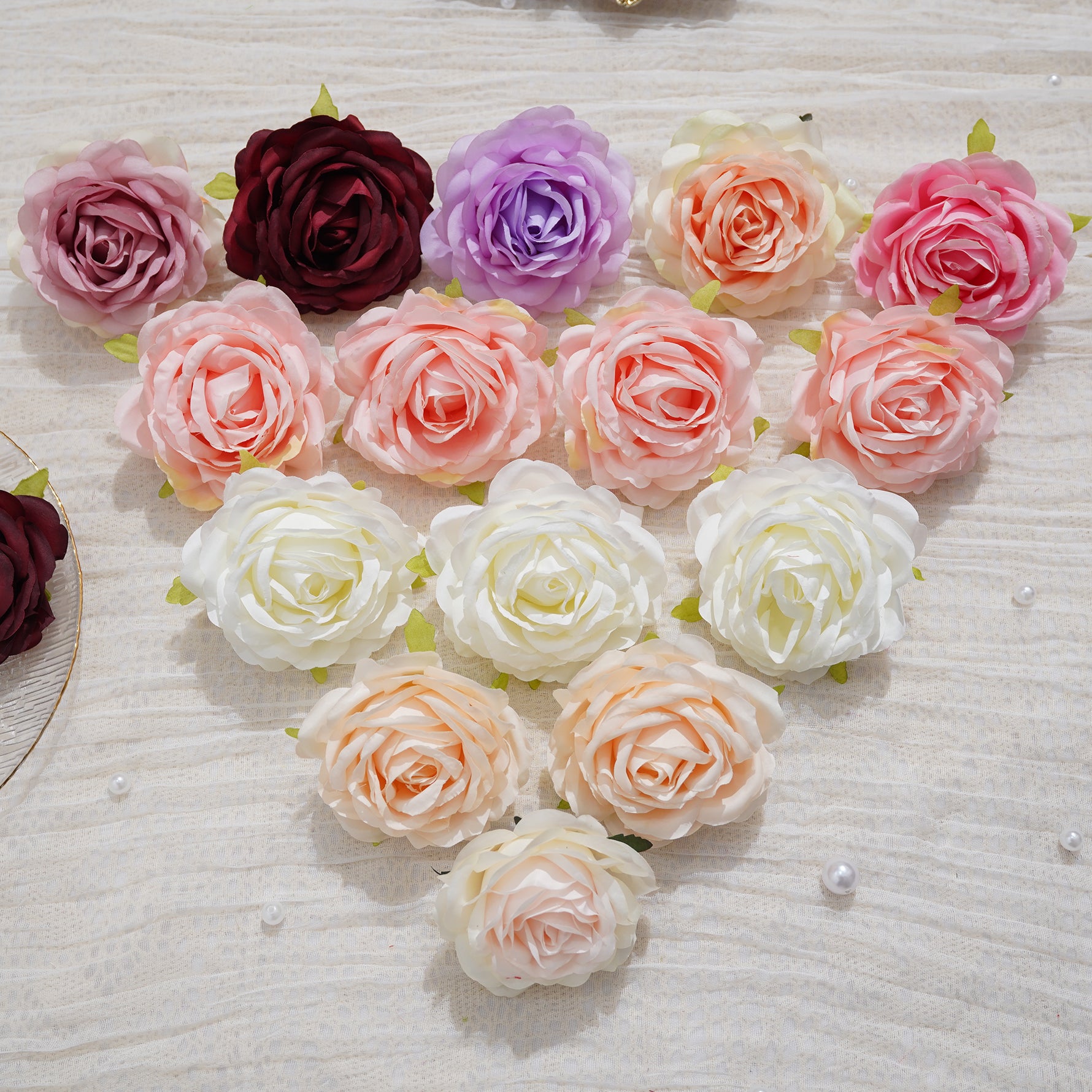 bright‑blush‑pink‑fake‑big‑rose‑bloom‑flat‑background‑photo