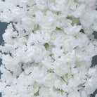 will you marry me photo backdrop with white florals