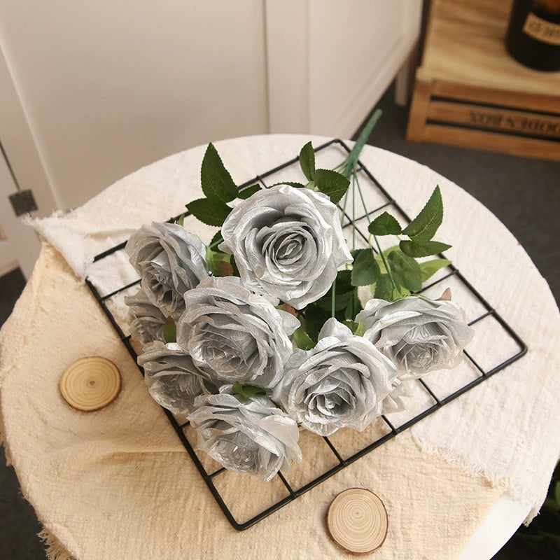 silver-faux-rose-bloom-macro-shot-with-foliage
