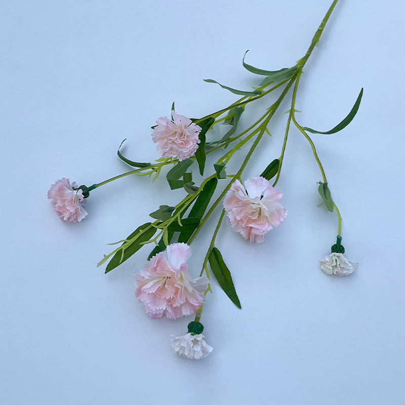 mixed‑tone‑fake‑carnation‑stems‑loose‑bunch‑floral‑arrangement‑shot