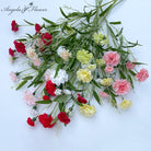 multicolor‑artificial‑carnation‑stems‑flat‑lay‑white‑background