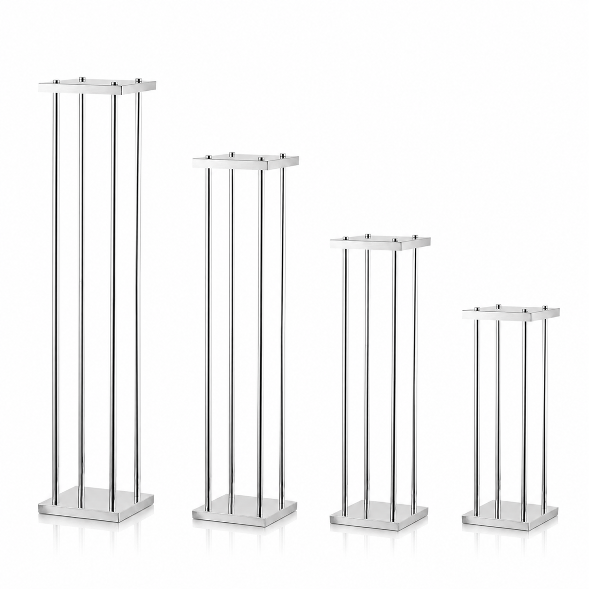 Silver metal pillar pedestals with soft window shadow on beige wall