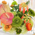tropical‑boho‑table‑centerpiece‑reception‑tablescape‑decor‑anthurium‑gloriosa