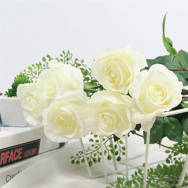 Artificial rose stem with leaves
