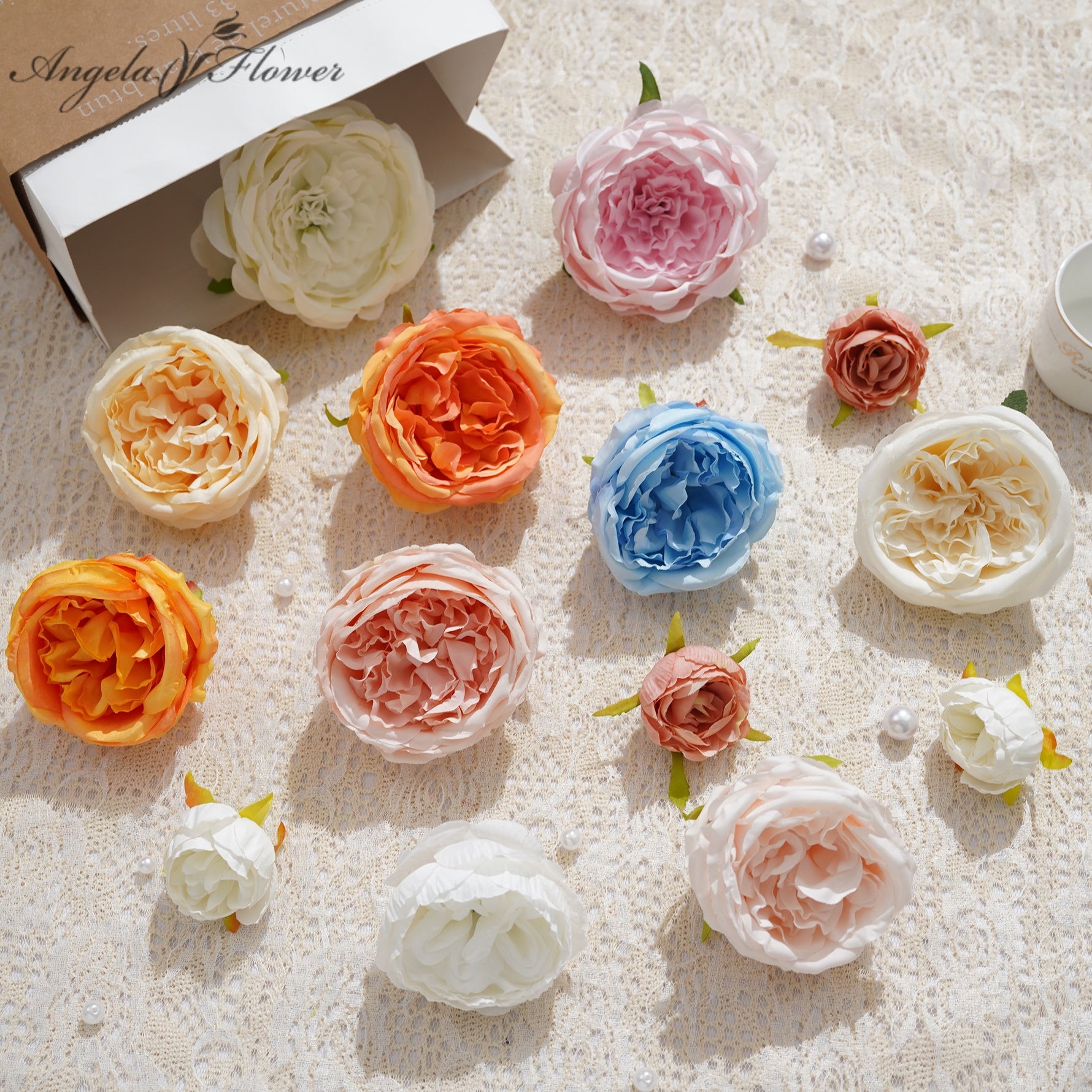 mixed_color_silk_rose_heads_flat_lay