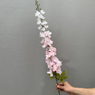 hot pink faux delphinium stem wedding backdrop