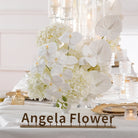 classic‑white‑hydrangea‑mixed‑blooms‑table‑center‑vase‑close‑up‑detail