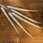 pink‑faux‑pampas‑spike‑stem‑grey‑wall‑product‑shot