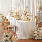 elegant wedding table centerpiece with white roses