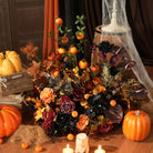 Group display of halloween flower balls on silver stands