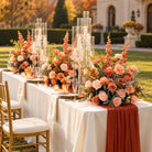 Artificial rose table centerpiece with greenery for fall wedding reception