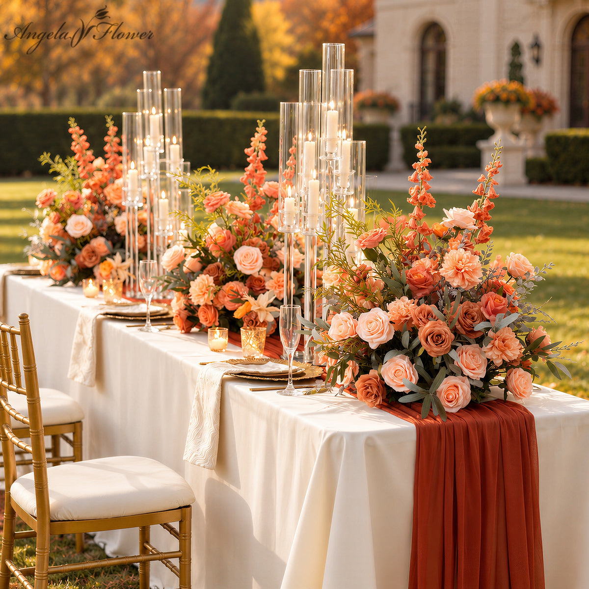 Artificial rose table centerpiece with greenery for fall wedding reception