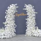 Mixed white rose hydrangea delphinium blooms for wedding curved arch