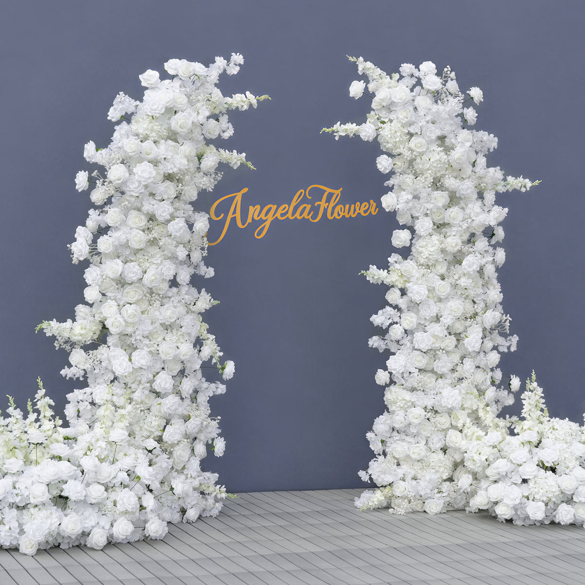 Mixed white rose hydrangea delphinium blooms for wedding curved arch