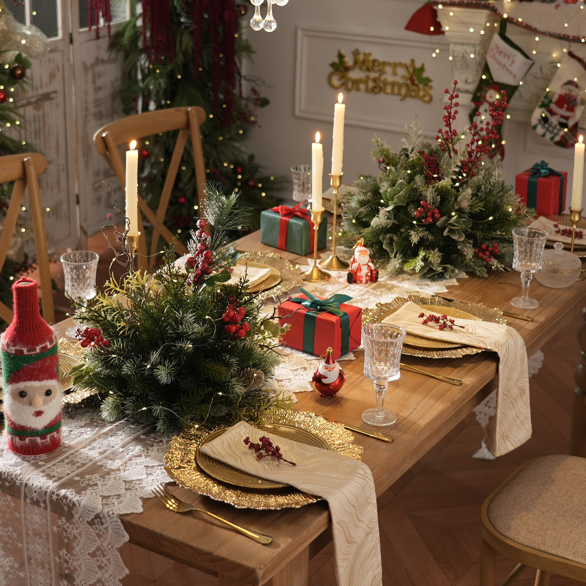 White house outdoor christmas arch styling with cream ribbon, red ornaments and winter foliage