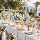 Outdoor garden wedding reception blue white silk table centerpiece