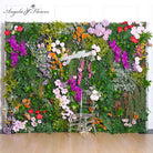 Wedding backdrop floral setup with mixed flowers and greenery
