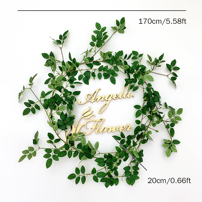 faux green wreath for wedding floral backdrop