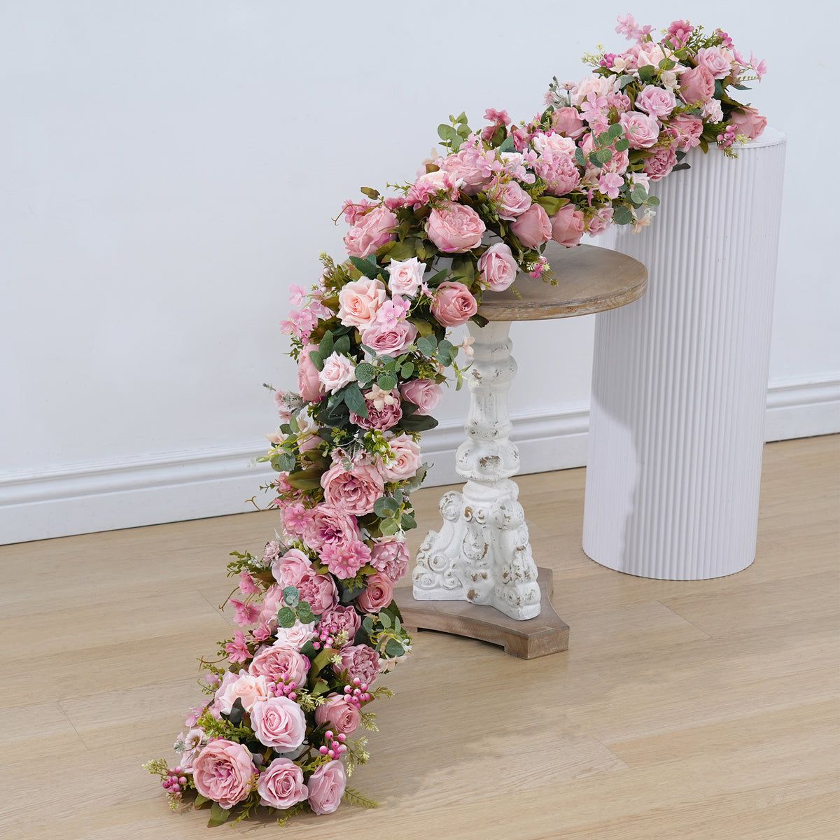 Artificial peony, rose and small flowers from wedding cascading table flower runner