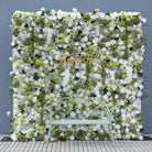 Wedding photobooth artificial flower wall, dense white ivory fake roses and green foliage event background decor