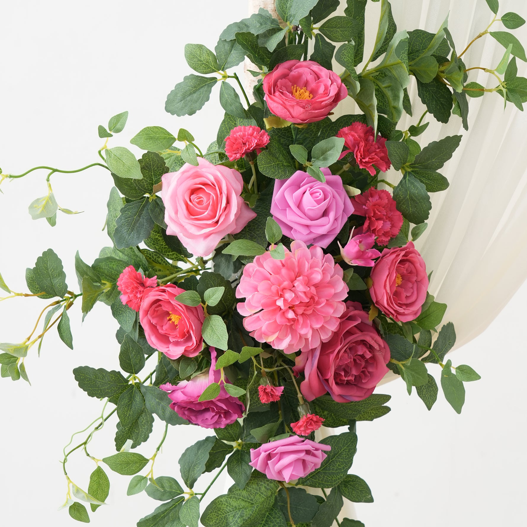 vibrant‑pink‑boho‑wedding‑arch‑side‑flower‑swags
