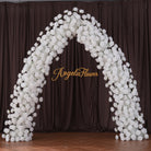 white_rose_arch_elegant_indoor_setup