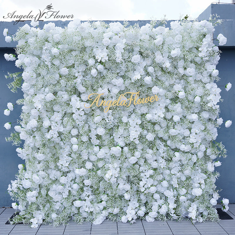  Outdoor installation of white flower wall as photo backdrop for garden wedding events