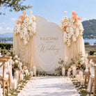 Elegant trailing floral swag for wedding backdrop corners