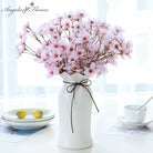 pink_faux_plum_branch_isolated