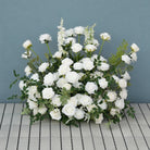 White ranunculus flower row for wedding backdrop styling