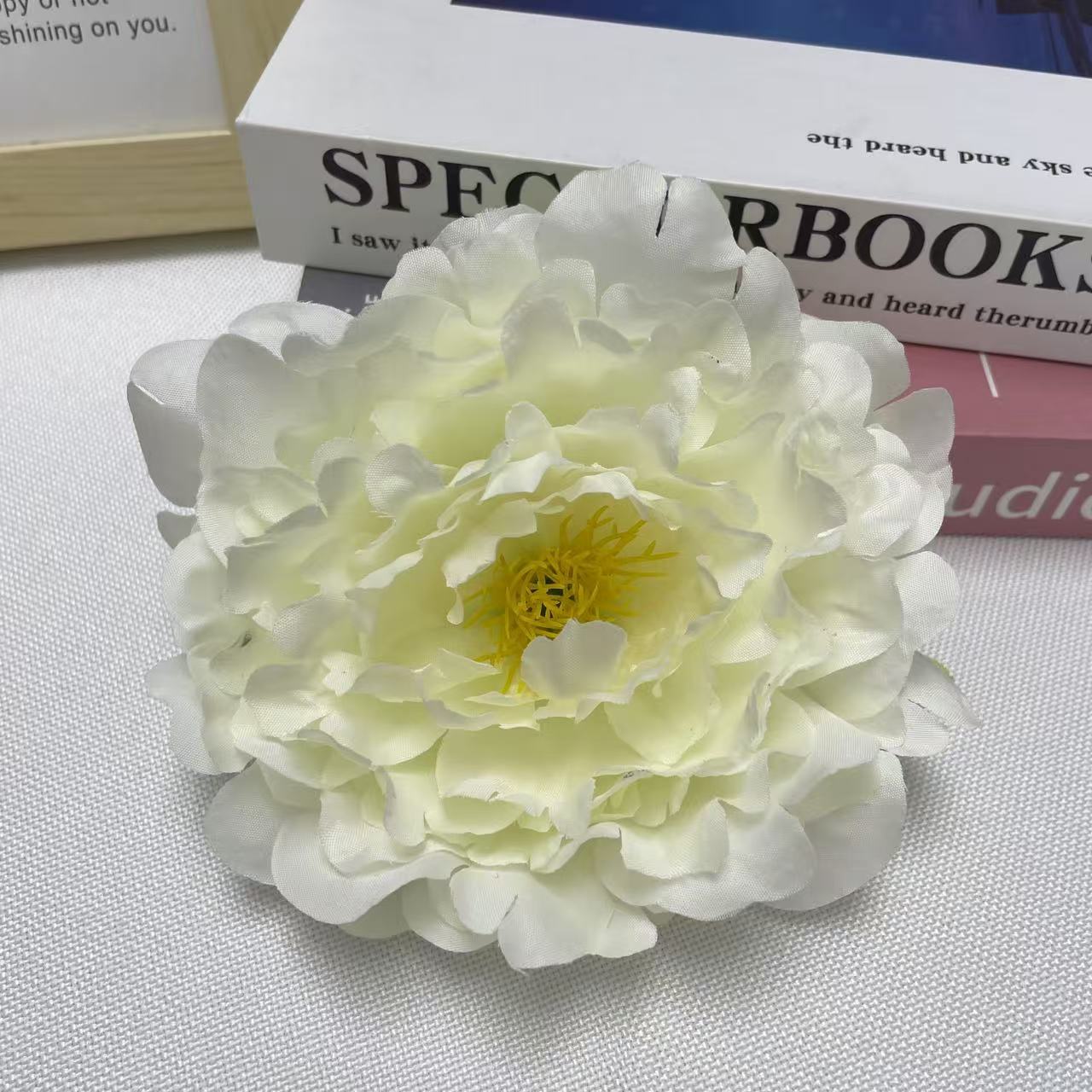wedding decor faux peony flower head closeup shot