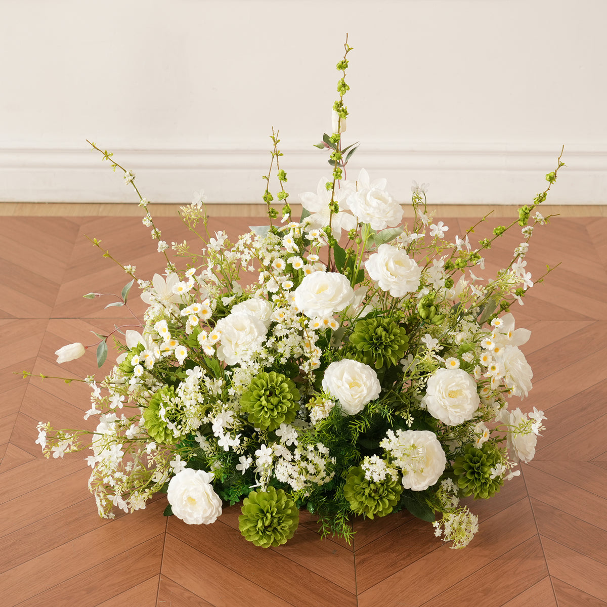 Soft textured white green mixed blooms wedding ground flower decor