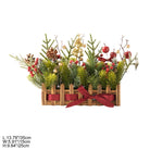Christmas reception table centerpiece with faux pine, frosted foliage and red berry clusters