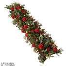 Christmas hanging floral swags with red roses, berries and evergreen foliage for hoop arch