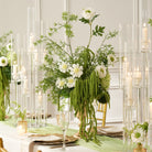 Spring green mixed silk flower centerpiece in gold vas